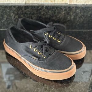 Black Vans sneakers